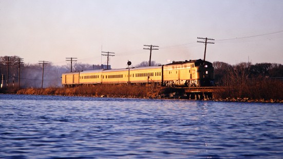 The Milwaukee Road passenger train no. 118, <i>The Varsity</i>, crossing Lake Monona in Madison, Wisconsin, on March 29, 1968. Photograph by Thomas F. McIlwraith, McIlwraith-01-015-08, © 2018, Center for Railroad Photography & Art, <a href="http://www.railphoto-art.org" rel="noreferrer nofollow">www.railphoto-art.org</a>