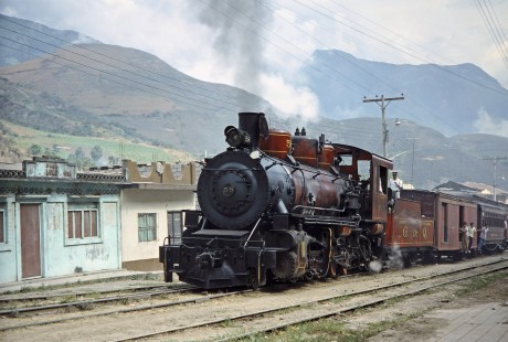 Guayaquil-Quito Railway steam locomotive no. 58 and passenger train arrive at Huigra, Chimborazo, Ecuador, on July 9, 1990. Photograph by Fred M. Springer, © 2014, Center for Railroad Photography and Art, Springer-ECU1-23-08