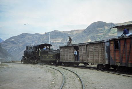Guayaquil-Quito Railway steam locomotive no. 44 leads a mixed freight and passenger train in Alausi, Chimborazo, Ecuador, on July 10, 1990. Photograph by Fred M. Springer, © 2014, Center for Railroad Photography and Art, Springer-SOAM1-01-12