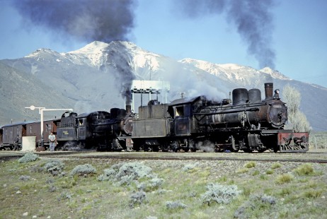 Viejo Expreso Patagónico (Old Patagonian Express) steam locomotives nos. 105 and 131 taking on water at La Cancha, Chubut, Argentina, on October 17, 1990. Photograph by Fred M. Springer, © 2014, Center for Railroad Photography and Art, Springer-SOAM1-17-35