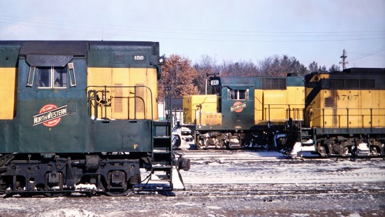 Chicago and North Western Railway diesel locomotives at the yard in Adams, Wisconsin, on January 25, 1969. From left to right are H16-66 no. 150, GP35 no. 841, and GP9 no. 1767. Photograph by Thomas F. McIlwraith, McIlwraith-01-025-09, © 2018, Center for Railroad Photography & Art, <a href="http://www.railphoto-art.org" rel="noreferrer nofollow">www.railphoto-art.org</a>