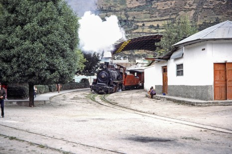 Guayaquil and Quito Railway steam locomotive no. 45 leads passenger train in Alausi, Chimborazo, Ecuador, on July 30, 1988. Photograph by Fred M. Springer, © 2014, Center for Railroad Photography and Art, Springer-ECU1-16-35