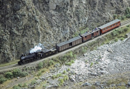 Guayaquil-Quito Railway steam locomotive no. 44 leading a mixed passenger train in Alausi, Chimborazo, Ecuador, on July 10, 1990. Photograph by Fred M. Springer, © 2014, Center for Railroad Photography and Art, Springer-SOAM1-01-04