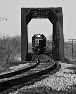 Southbound Missouri–Kansas–Texas Railroad freight train crosses short bridge near Taylor, Texas, in March 1970. Photograph by J. Parker Lamb, © 2016, Center for Railroad Photography and Art. Lamb-02-044-04