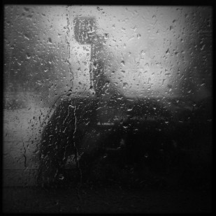 Photographer's notes: “Jessica,” 4-8-2 steam locomotive no. Ja1240, seen through a rain-soaked window at Arthurs Pass Station, New Zealand. The locomotive was working a Christchurch to Arthurs Pass special train on October 26, 2013, as part of the 150th anniversary celebration of railways in New Zealand. Shot on an iPhone 5 using the Hipstamatic app with the 'BlacKeys film' and 'Jane lens' filters pre-applied before being taken. 

Read more about the <a href="http://www.railphoto-art.org/awards/2016-awards/" rel="nofollow">2016 John E. Gruber Creative Photography Awards Program</a>.