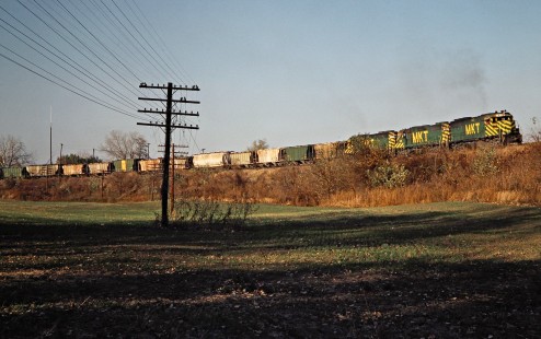 Eastbound Missouri–Kansas–Texas Railroad freight train on Burlington Northern Railroad track at West Alton, Missouri, on October 25, 1979. Photograph by John F. Bjorklund, © 2016, Center for Railroad Photography and Art. Bjorklund-70-03-20