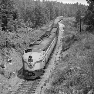 Birmingham-bound Seaboard Air Line Railroad <i>Comet</i> passenger train curves through wooded area 15 miles east of its destination in July 1957. Photograph by J. Parker Lamb, © 2016, Center for Railroad Photography and Art. Lamb-02-021-05