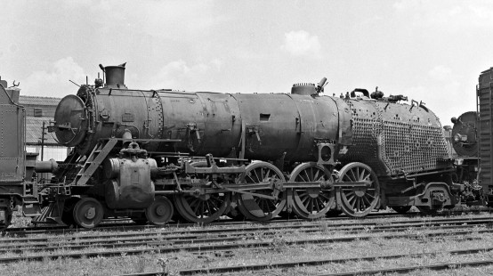 4-8-2 steam locomotive owned by the West Point Route sits in downtown Atlanta, Georgia, in September 1961. Lamb said, "While viewing a dismantled steam locomotive that I once photographed in operation is not a happy event, I realized that such photos also provide a significant amount of detail about parts of an engine that are seldom seen, except during building and repair. I had photographed these engines in operation between Montgomery, Alabama, and Atlanta during my college years." Photograph by J. Parker Lamb, © 2016, Center for Railroad Photography and Art.  Lamb-02-037-07