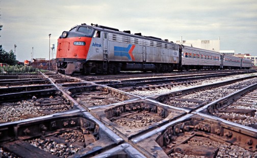 Westbound Amtrak passenger train no. 373, the <i>Michigan Executive</i>, operating on Conrail in Detroit, Michigan, on July 1, 1976. Photograph by John F. Bjorklund, © 2016, Center for Railroad Photography and Art. Bjorklund-80-10-16