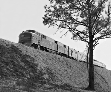 Atlanta-bound, vest-pocket streamliner Central of Georgia Railway <i>Man O' War</i> passenger train departs Columbus, Georgia, in March 1954. Photograph by J. Parker Lamb, © 2016, Center for Railroad Photography and Art. Lamb-02-011-07