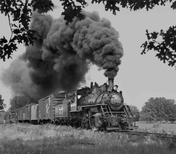 Mississippian Railway no. 77 charges through wooded area en route to Amory, Mississippi, in August 1960. Photograph by J. Parker Lamb, © 2016, Center for Railroad Photography and Art. Lamb-02-028-12