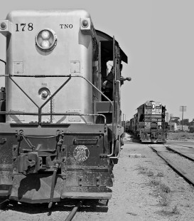 Inbound Southern Pacific Railroad local freight train from Burnet, Texas, passes Baldwin switcher at Austin Yard in September 1964. Photograph by J. Parker Lamb, © 2016, Center for Railroad Photography and Art. Lamb-02-049-02