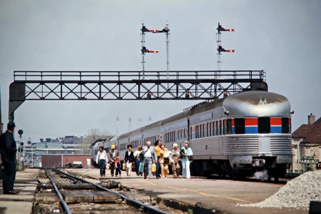 Eastbound Amtrak passenger train no. 302, the <i>Abe Lincoln</i>, on Illinois Central Gulf Railroad track in Joliet, Illinois, on April 17, 1976. Photograph by John F. Bjorklund, © 2016, Center for Railroad Photography and Art. Bjorklund-60-09-13
