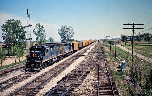 Westbound Baltimore and Ohio Railroad freight train in Hamler, Ohio, on May 8, 1977. Photograph by John F. Bjorklund, © 2016, Center for Railroad Photography and Art. Bjorklund-92-26-04