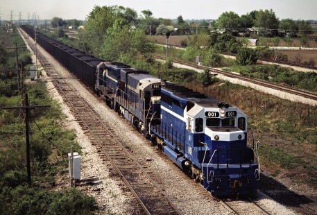 Detroit Edison coal train in Vienna, Michigan, running northbound on the Grand Trunk Western Railroad at Summit St. on May 4, 1985. Photograph by John F. Bjorklund, © 2016, Center for Railroad Photography and Art. Bjorklund-59-03-18
