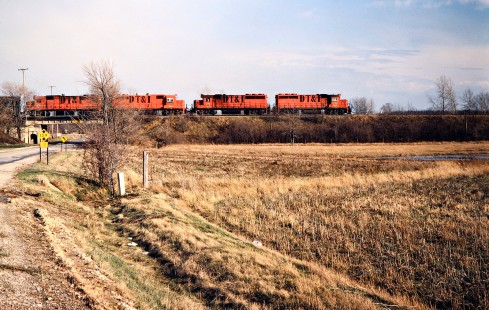 Southbound Detroit, Toledo and Ironton Railroad freight train in Dundee, Michigan, on April 14, 1979. Photograph by John F. Bjorklund, © 2016, Center for Railroad Photography and Art. Bjorklund-51-11-15
