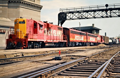 Westbound Rock Island freight train at Joliet, Illinois, on April 17, 1976. Photograph by John F. Bjorklund, © 2016, Center for Railroad Photography and Art. Bjorklund-82-07-08