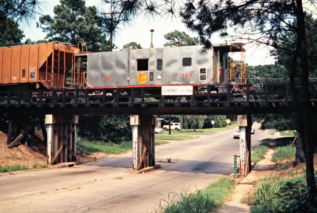 Caboose of a northbound Kansas City Southern Railway freight train in Texarkana, Texas, on July 22, 1977. Photograph by John F. Bjorklund, © 2016, Center for Railroad Photography and Art. Bjorklund-61-23-07