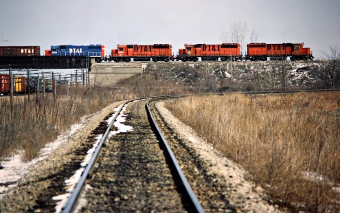 Southbound Detroit, Toledo and Ironton Railroad freight train  in Delta, Ohio, on March 11, 1984. Photograph by John F. Bjorklund, © 2016, Center for Railroad Photography and Art. Bjorklund-52-17-11