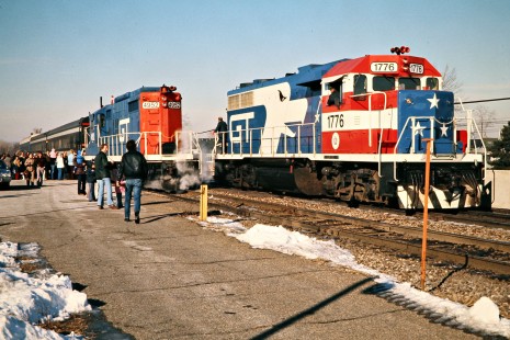 Grand Trunk Western Railroad in Royal Oak, Michigan, with GTW's Santa Claus train and bicentennial locomotive no. 1776 on December 11, 1976. Photograph by John F. Bjorklund, © 2016, Center for Railroad Photography and Art. Bjorklund-58-17-04