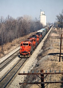 Southbound Detroit, Toledo and Ironton Railroad freight train on Baltimore and Ohio track in Cairo, Ohio, on March 15, 1980. Photograph by John F. Bjorklund, © 2016, Center for Railroad Photography and Art. Bjorklund-51-27-17