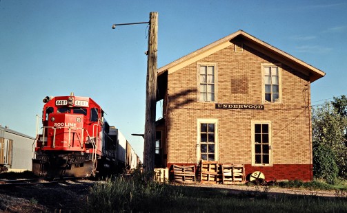 Northbound Soo Line Railroad freight train at station in Underwood, North Dakota, on July 7, 1980. Photograph by John F. Bjorklund, © 2016, Center for Railroad Photography and Art. Bjorklund-83-10-01