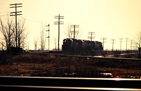 Southbound Detroit, Toledo and Ironton Railroad freight train in Hamler, Ohio, on April 5, 1980. Photograph by John F. Bjorklund, © 2016, Center for Railroad Photography and Art. Bjorklund-51-29-04