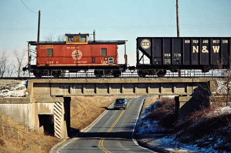 Caboose of a southbound Detroit, Toledo and Ironton Railroad freight train in Liberty Center, Ohio, on February 2, 1980. Photograph by John F. Bjorklund, © 2016, Center for Railroad Photography and Art. Bjorklund-51-24-11