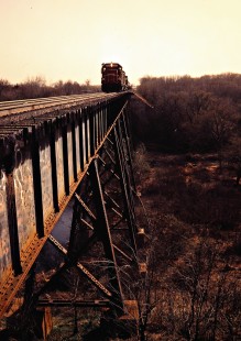 Eastbound Soo Line Railroad freight train crossing bridge near South Haven, Minnesota, on April 17, 1981. Photograph by John F. Bjorklund, © 2016, Center for Railroad Photography and Art. Bjorklund-83-16-01