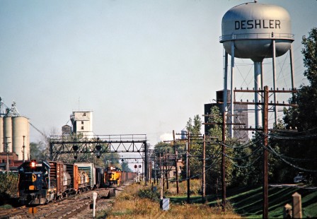 Two Southbound Baltimore and Ohio Railroad freight trains in Deshler, Ohio, on September 28, 1975. Photograph by John F. Bjorklund, © 2016, Center for Railroad Photography and Art. Bjorklund-92-16-20