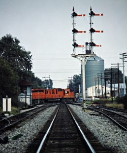 Southbound Detroit, Toledo and Ironton Railroad at Conrail crossing in Quincy, Ohio, on September 11, 1982. Photograph by John F. Bjorklund, © 2016, Center for Railroad Photography and Art. Bjorklund-52-15-14