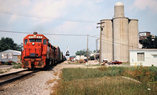 Southbound Detroit, Toledo and Ironton Railroad freight train in Maybee, Michigan, on July 30, 1977. Photograph by John F. Bjorklund, © 2016, Center for Railroad Photography and Art. Bjorklund-51-07-06