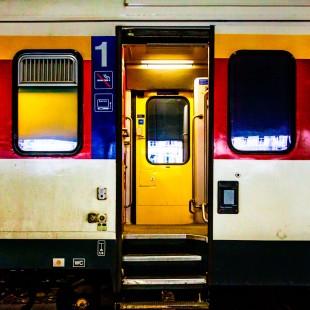 "Come on in..." A Swiss commuter rail car awaits passengers at the Basel SBB Railway Station in Basel, Switzerland, on March 7, 2012. The photographer used Adobe Photoshop to increase color saturation and contrast, add noise, and crop the image to a square format.