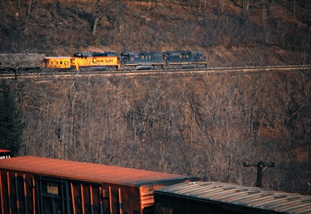 Helper locomotives pushing a westbound Baltimore and Ohio Railroad freight train near Mance, Pennsylvania, on March 23, 1975. Photograph by John F. Bjorklund, © 2016, Center for Railroad Photography and Art. Bjorklund-92-15-15