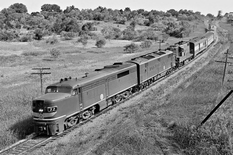Mixture of first generation diesel locomotives leads northbound Missouri Pacific Railroad <i>Texas Eagle</i> passenger train as it approaches Austin, Texas, in May 1964. Photograph by J. Parker Lamb, © 2016, Center for Railroad Photography and Art. Lamb-02-058-10
