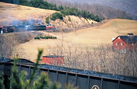 Westbound Western Maryland Railway freight train at Helmstetter's Curve in Cumberland, Maryland, on March 23, 1975. Photograph by John F. Bjorklund, © 2016, Center for Railroad Photography and Art. Bjorklund-92-06-16
