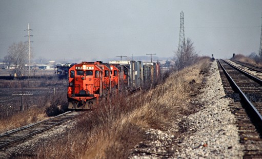 Southbound Detroit, Toledo and Ironton Railroad freight train in Delta, Ohio, on March 15, 1980. Photograph by John F. Bjorklund, © 2016, Center for Railroad Photography and Art. Bjorklund-51-26-19