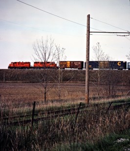 Northbound Detroit, Toledo and Ironton Railroad freight train passing through Delta, Ohio, on May 6, 1979. Photograph by John F. Bjorklund, © 2016, Center for Railroad Photography and Art. Bjorklund-51-20-22