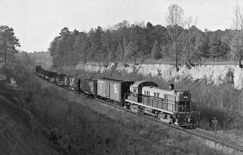 Southbound Central of Georgia Railway local approaches Opelika, Alabama, with more empties than loads in late afternoon of December 1954. Photograph by J. Parker Lamb, © 2016, Center for Railroad Photography and Art. Lamb-02-010-09