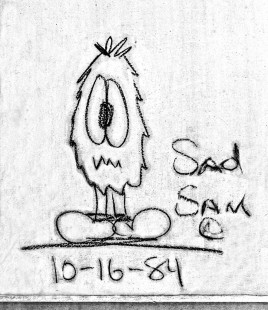 Freight car graffiti before the spray can era. "Sad Sam" at San Antonio, Texas, in 1984. Photograph by J. Parker Lamb, © 2016, Center for Railroad Photography and Art. Lamb-02-078-03