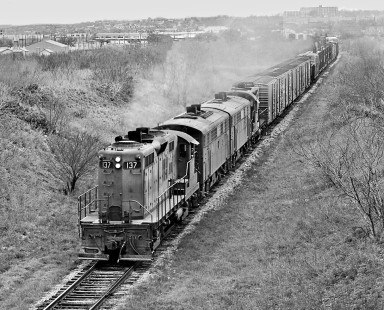 Austin-bound Missouri–Kansas–Texas Railroad freight train ducks under Southern Pacific Railroad mainline as it departs San Antonio, Texas, in January 1965. Photograph by J. Parker Lamb, © 2016, Center for Railroad Photography and Art. Lamb-02-040-11