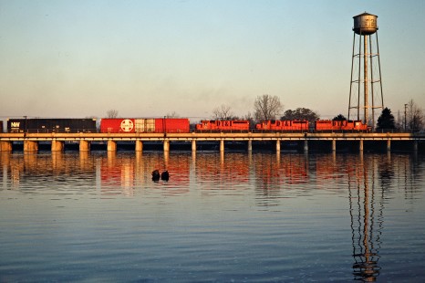 Northbound Detroit, Toledo and Ironton Railroad freight train crossing bridge in Flat Rock, Michigan, on November 18, 1979. Photograph by John F. Bjorklund, © 2016, Center for Railroad Photography and Art. Bjorklund-51-22-11