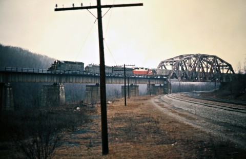 Eastbound Western Maryland Railway freight train crossing the Keystone Viaduct over the Baltimore & Ohio main line in Meyersdale, Pennsylvania, on March 22, 1975. Photograph by John F. Bjorklund, © 2016, Center for Railroad Photography and Art. Bjorklund-92-02-03