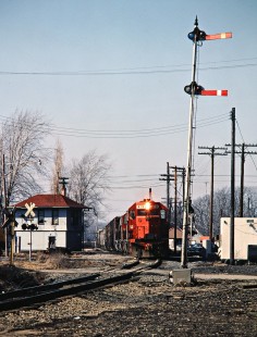 Southbound Detroit, Toledo and Ironton Railroad freight train at Conrail in Quincy, Ohio, on March 15, 1980. Photograph by John F. Bjorklund, © 2016, Center for Railroad Photography and Art. Bjorklund-51-27-01