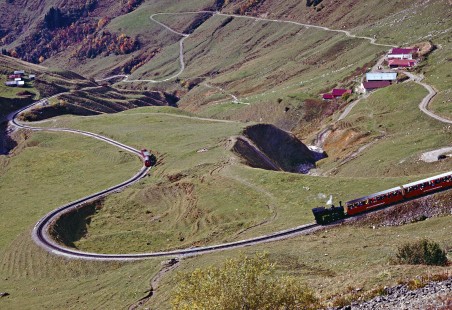 Three trains (the third is barely visible in the far distance) on the Brienz-Rothorn Railway on October 21, 2000. Photograph by Fred M. Springer, © 2016, Center for Railroad Photography and Art. Springer-Swiss(2)-02-18