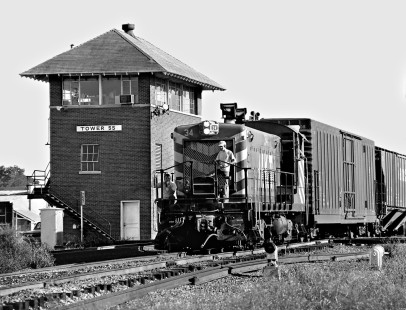 Missouri–Kansas–Texas Railroad switcher (an upgraded Baldwin) eases past Tower 55 at Fort Worth, Texas, in late afternoon during August 1975. Photograph by J. Parker Lamb, © 2016, Center for Railroad Photography and Art. Lamb-02-047-09