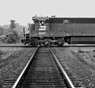 Fort Worth-bound Missouri–Kansas–Texas Railroad empty coal train with Burlington Northern power crosses Southern Pacific Railroad near West Point, Texas, in July 1980. Most Texas coal trains carried units from more than one railroad. Photograph by J. Parker Lamb, © 2016, Center for Railroad Photography and Art. Lamb-02-046-05