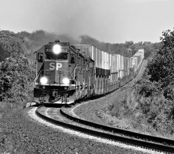 Westbound Southern Pacific Railroad container train traverses winding route near Luling, Texas, in August 1980. Photograph by J. Parker Lamb, © 2016, Center for Railroad Photography and Art. Lamb-02-077-05