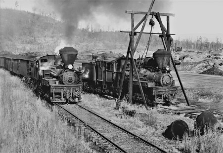 Shay no. 5 pulls loaded cars away from Twin Seams Mining Company tipple at Kellerman, Alabama, passing inactive Shay and a pair of discarded stacks in September 1959. Photograph by J. Parker Lamb, © 2016, Center for Railroad Photography and Art. Lamb-02-036-08