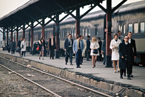 Passengers fro Grand Trunk Western Railroad commuter train no. 994 at Brush Street Station in Detroit, Michigan, on April 20, 1973. Photograph by John F. Bjorklund, © 2016, Center for Railroad Photography and Art. Bjorklund-58-14-26